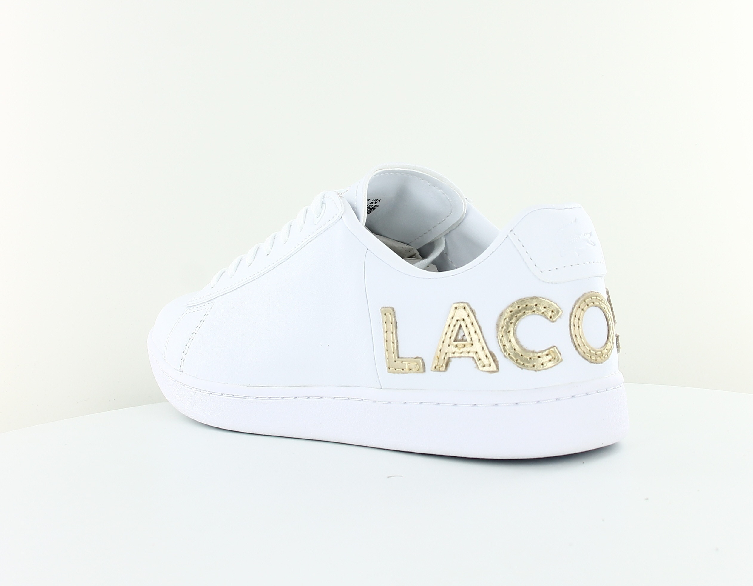 lacoste blanche et or